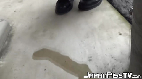Teenage Asian redhead filmed while peeing on the street