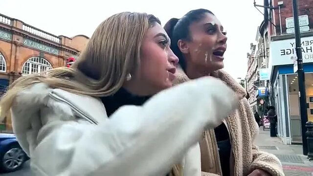 Two hot babes strut their stuff in London Cumwalk