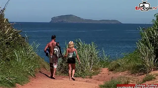 Sandwich fmm threesome at the beach with a blonde girl